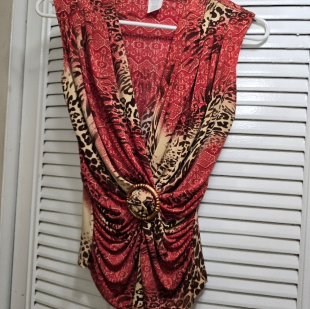 Four used beautiful blouses size S, M. Five blouses $8